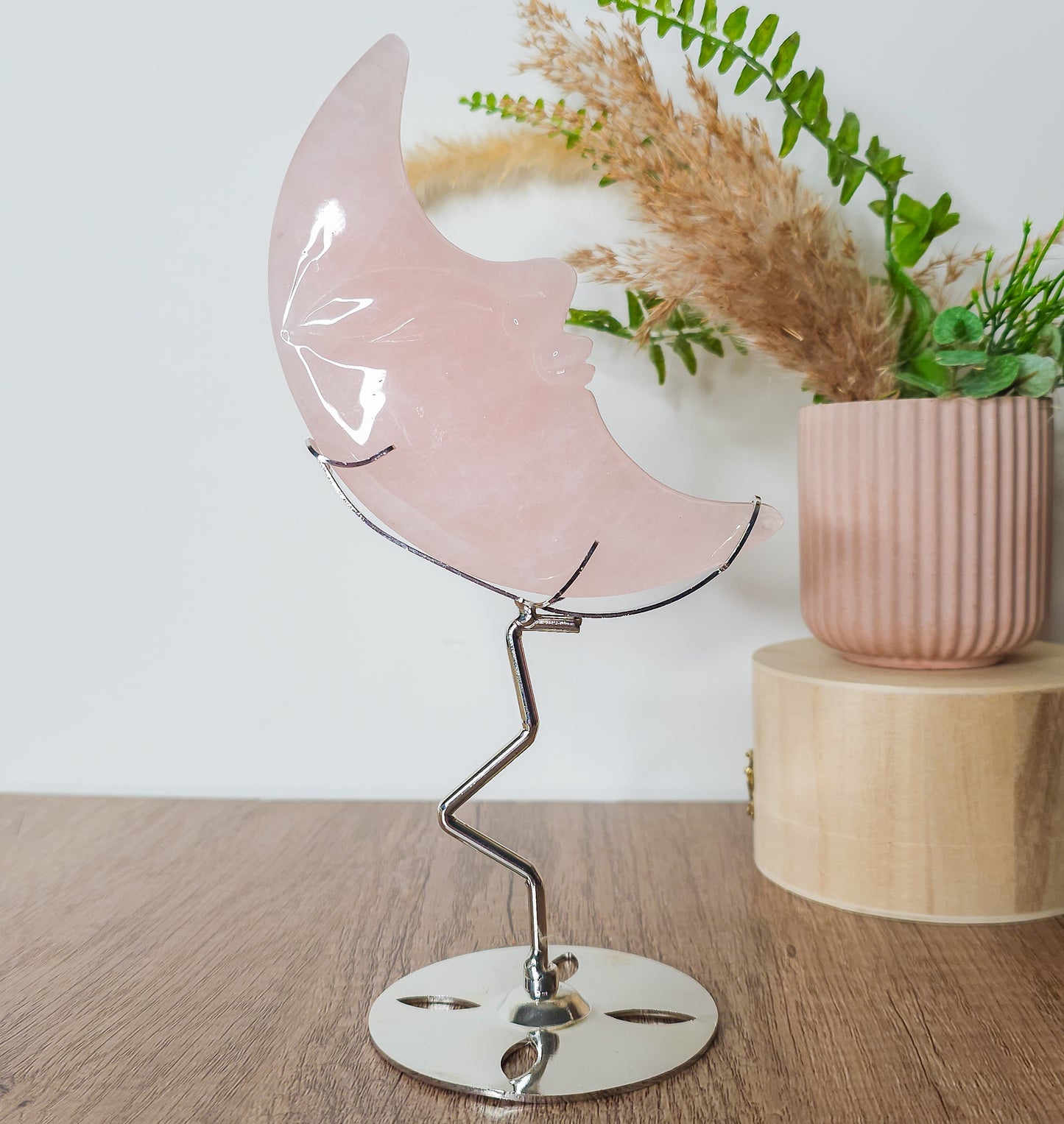 Rose Quartz Moon Face on the stand