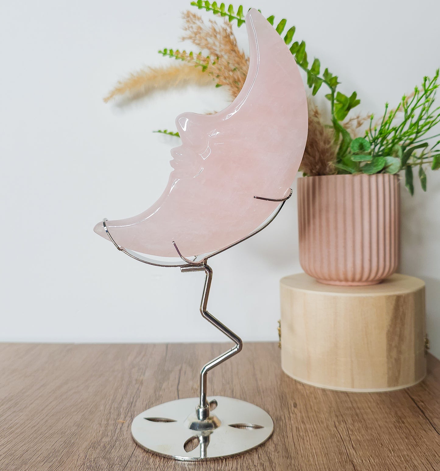 Rose Quartz Moon Face on the stand