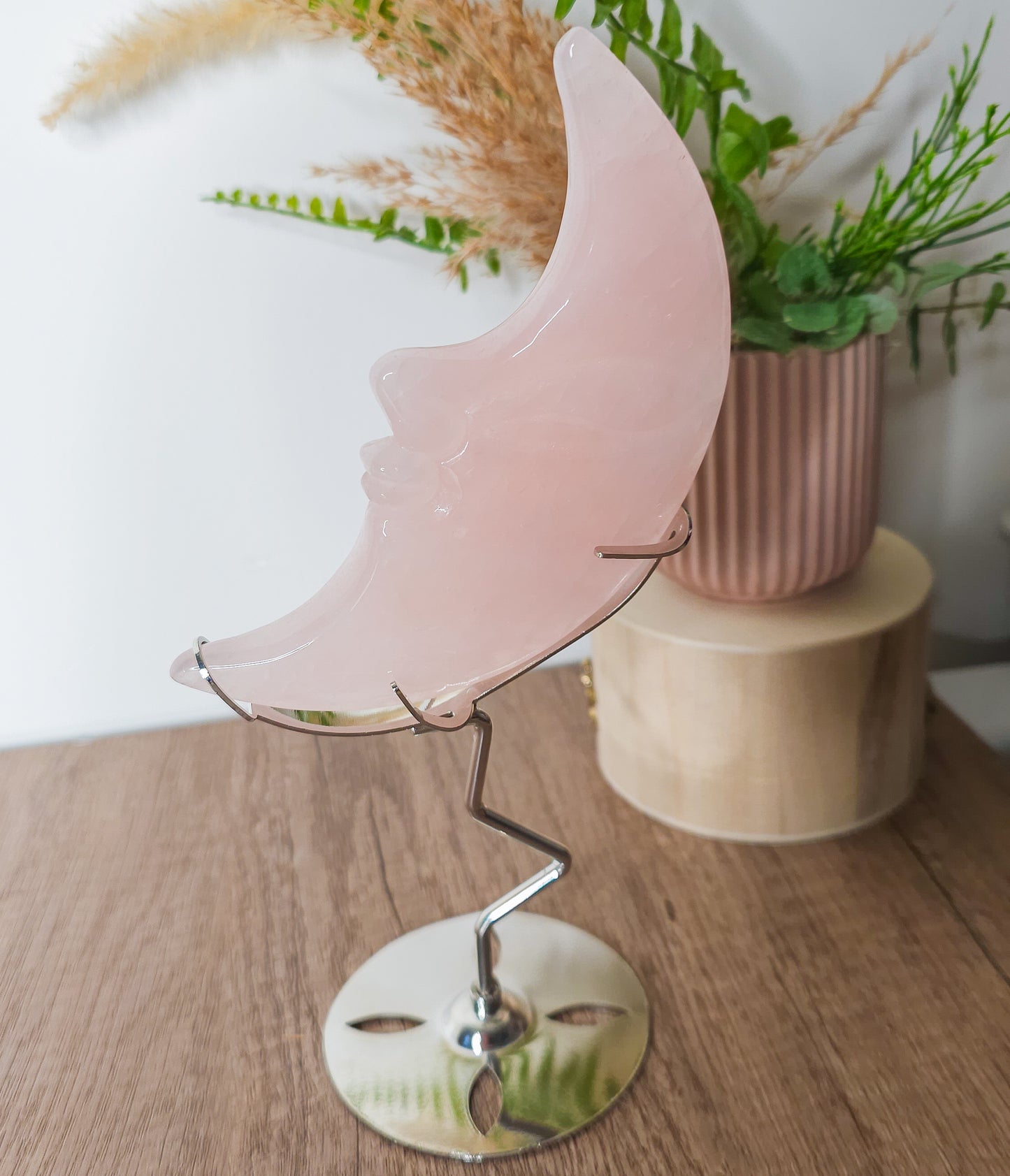 Rose Quartz Moon Face on the stand