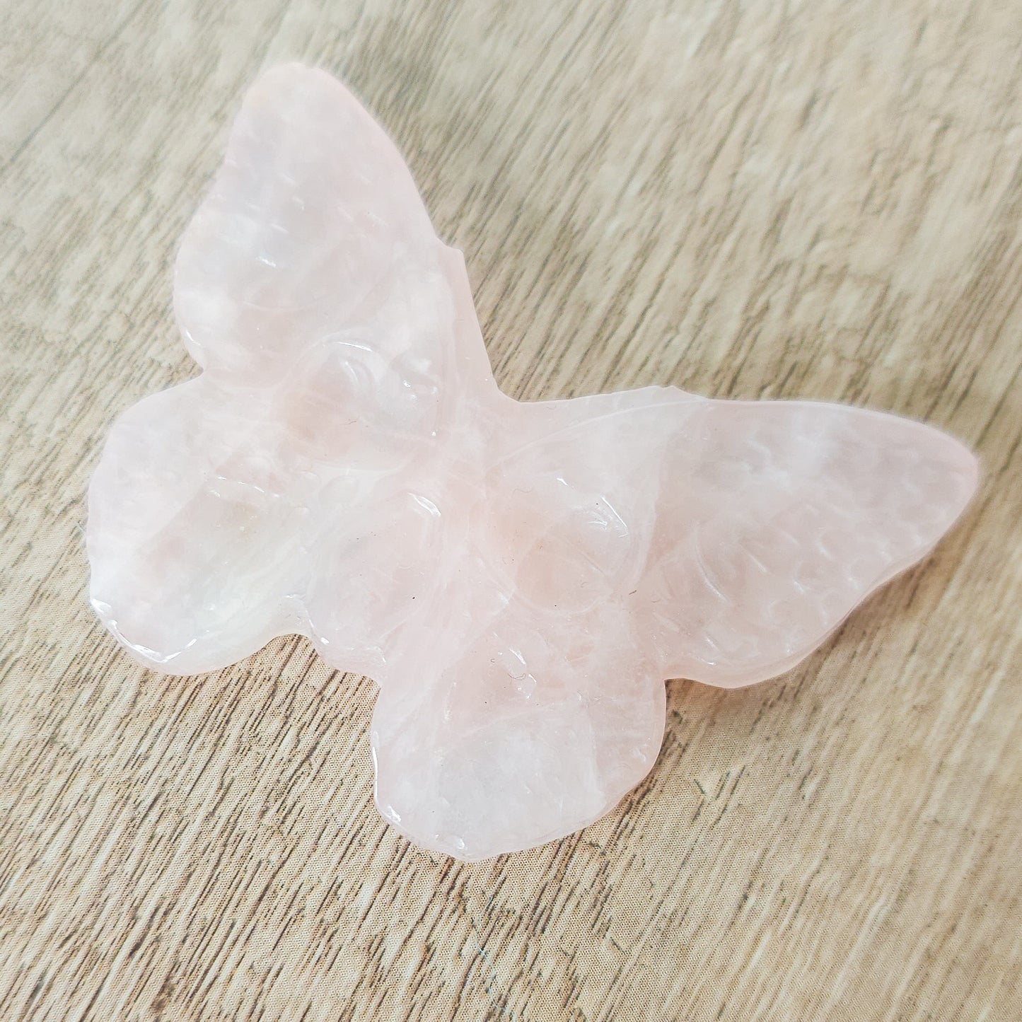 Detailed Butterfly With Engraved Skull Carving