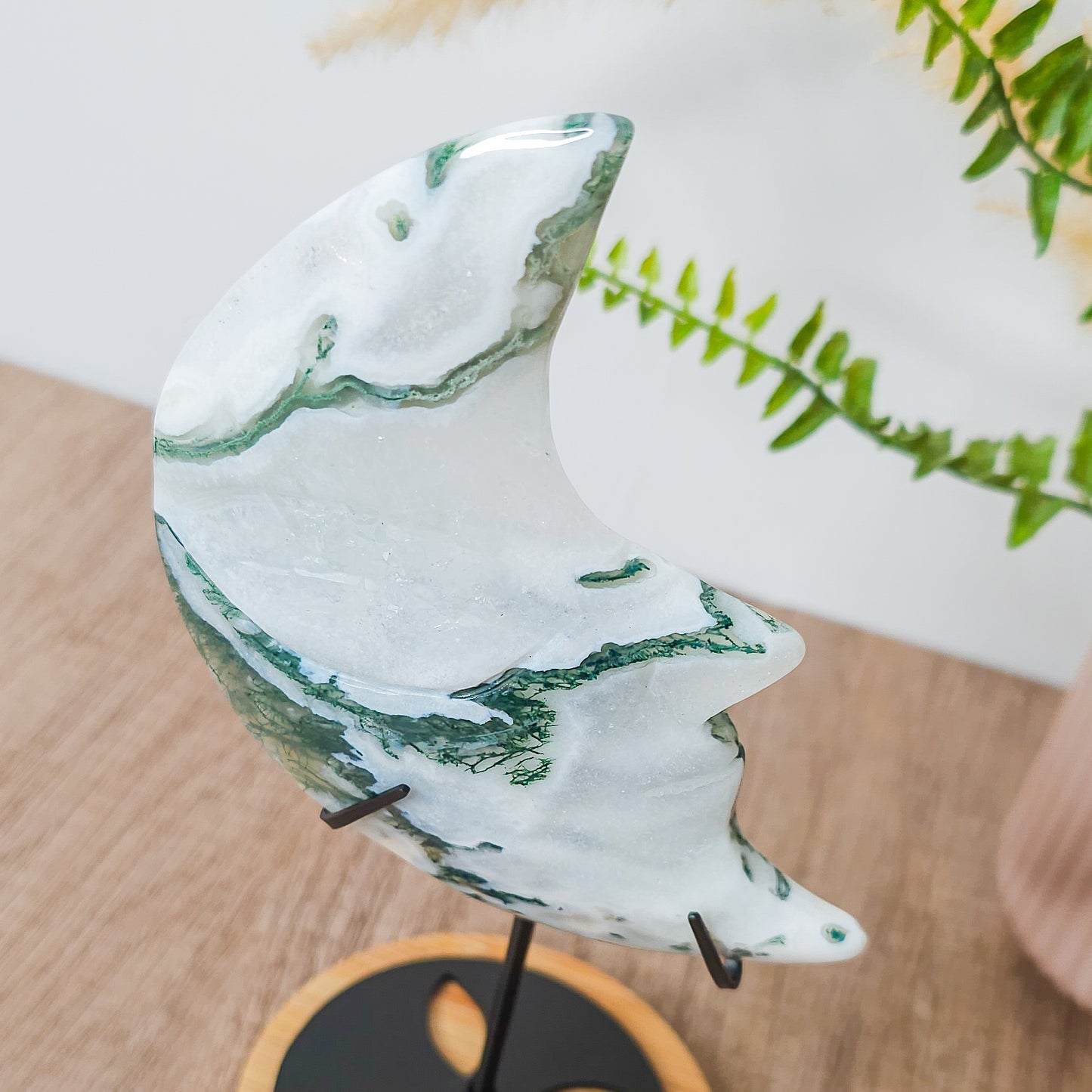 Moss Agate Moon Face on the stand
