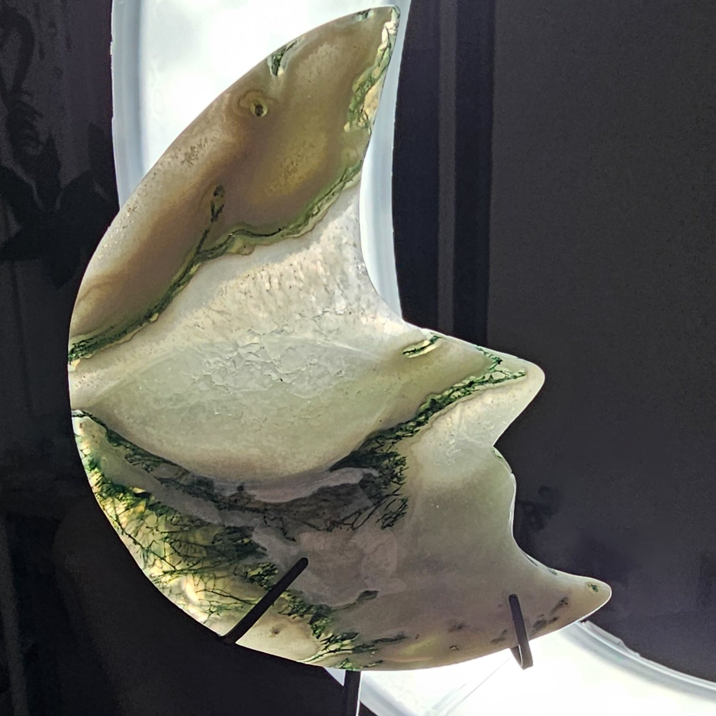 Moss Agate Moon Face on the stand