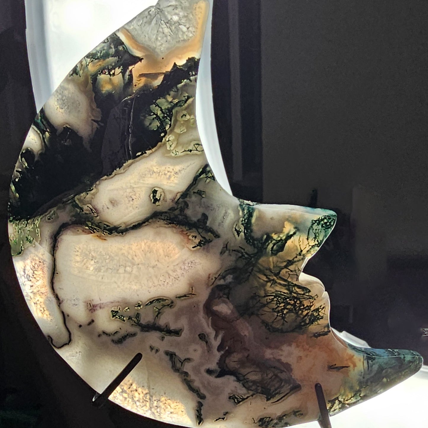 Moss Agate Moon Face on the stand