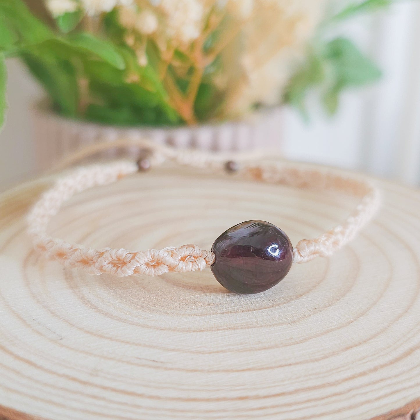 Handmade macrame bracelet with Garnet beads, infused with intention to support strength, grounding, and soul alignment