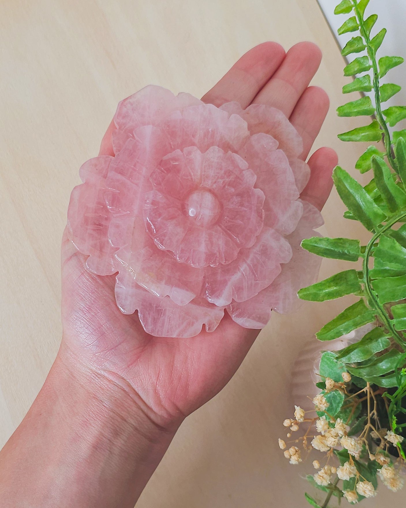 Rose Quartz flower crystal carving without stand, polished petals in gentle pink tones, a symbol of emotional healing and inner peace.