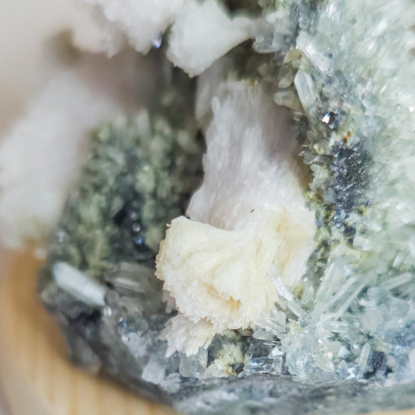 Fluorescent Calcite on Chlorite Phantom Quartz Specimen