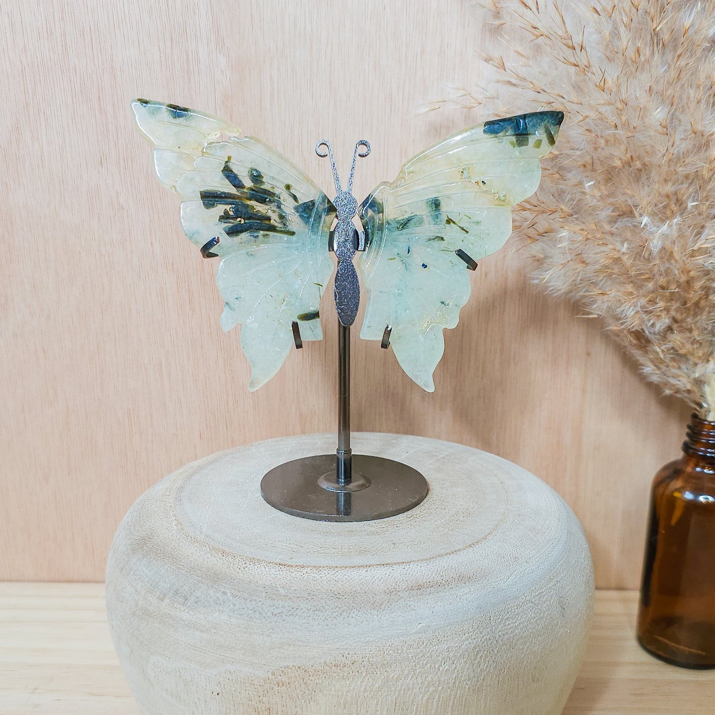 Prehnite with Epidote Butterfly Wings on the stand