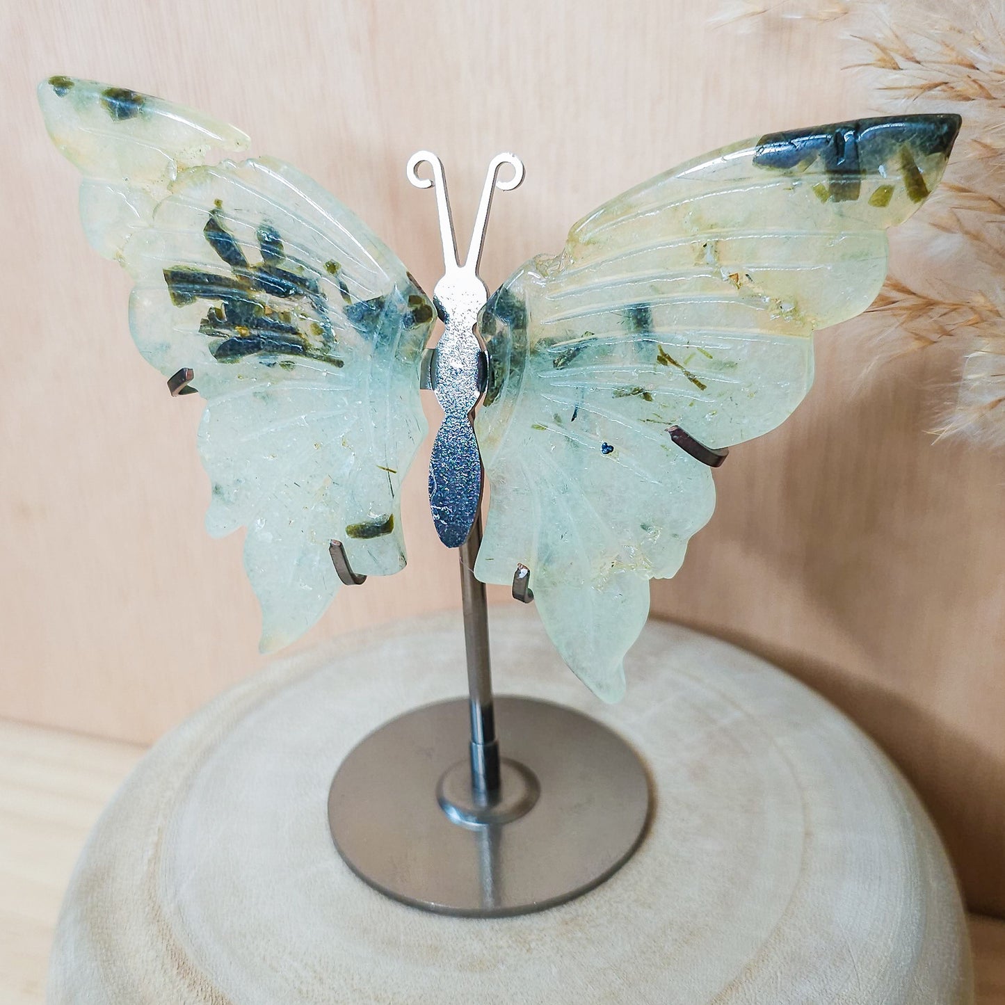 Prehnite with Epidote Butterfly Wings on the stand