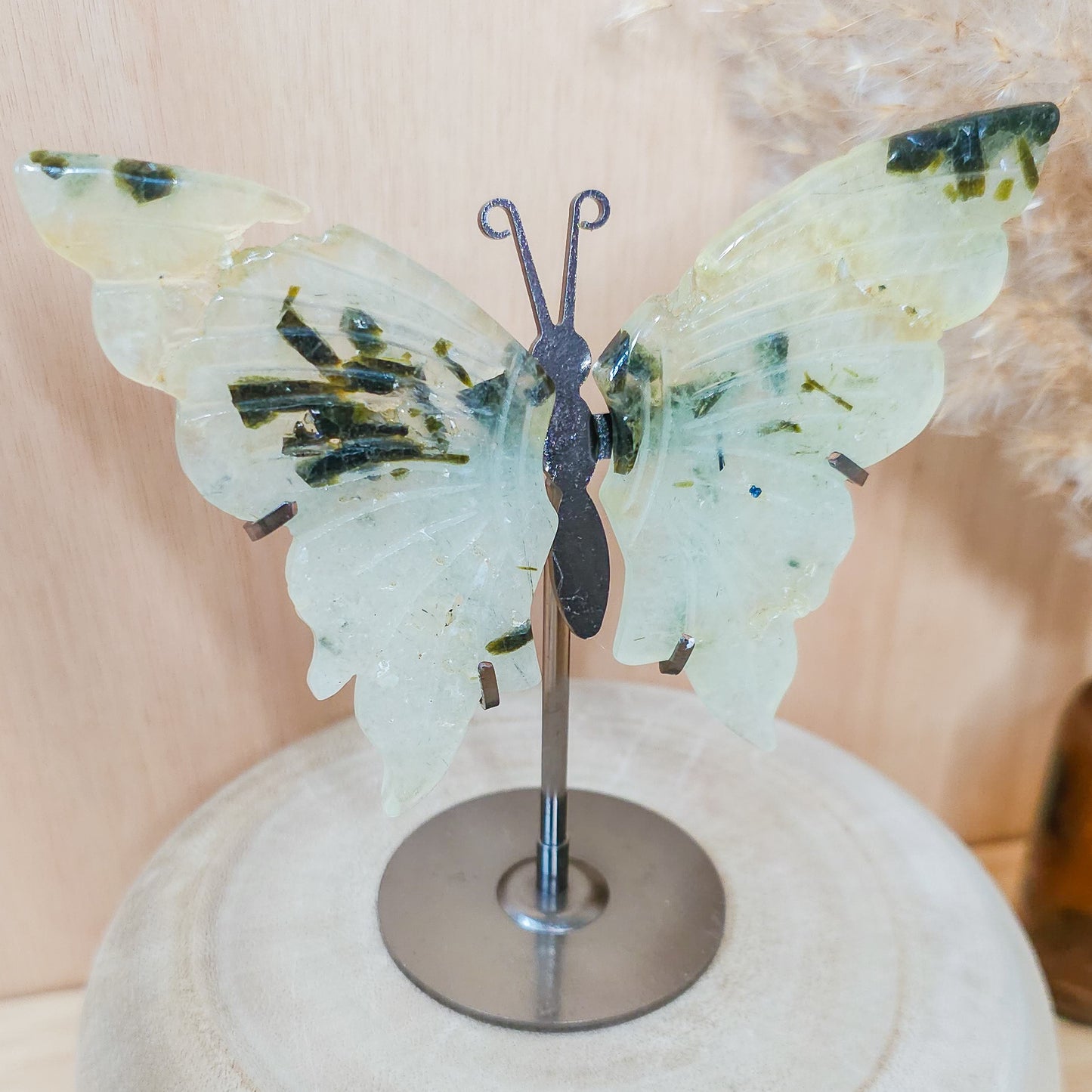 Prehnite with Epidote Butterfly Wings on the stand