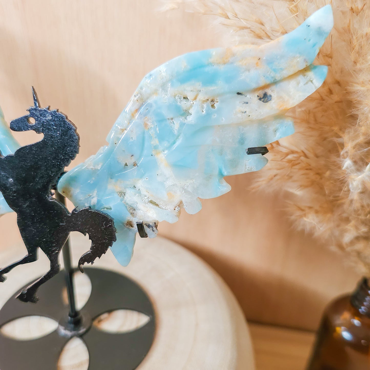 Calcite Unicorn wings on the stand