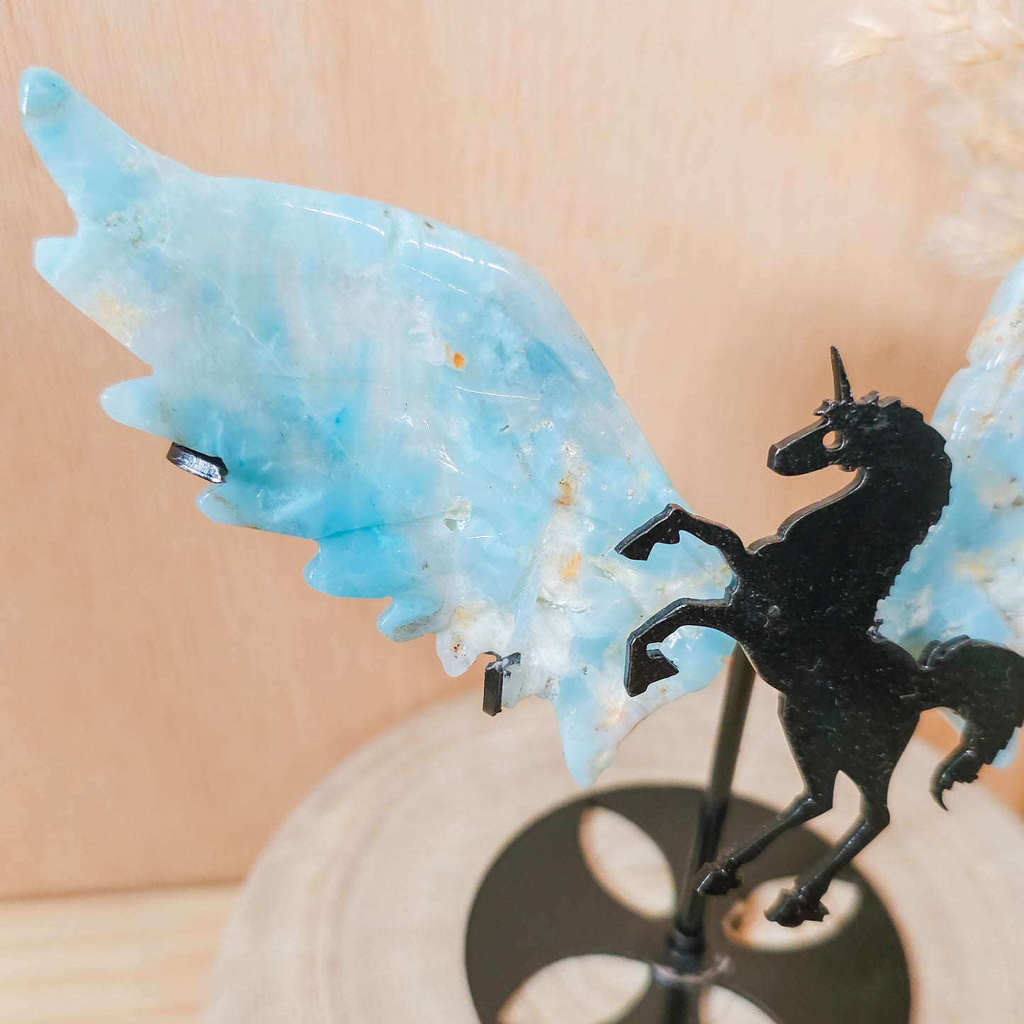 Calcite Unicorn wings on the stand