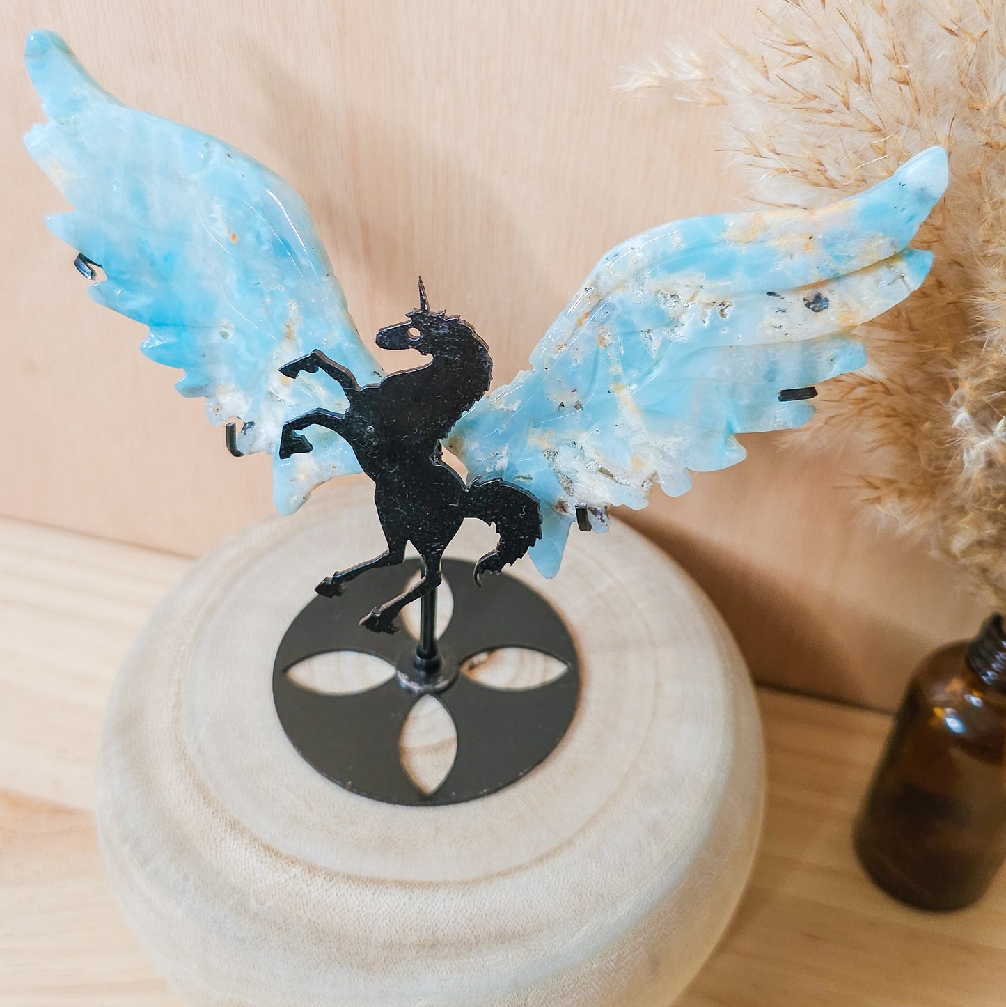 Calcite Unicorn wings on the stand