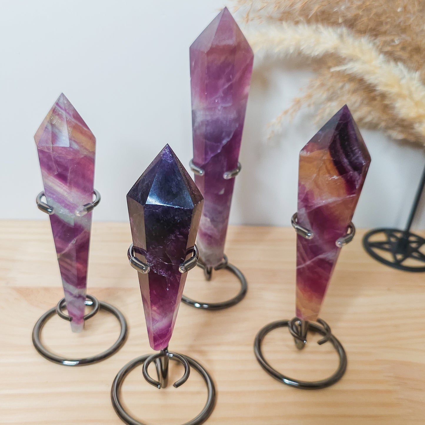 Fluorite Wands on the stand