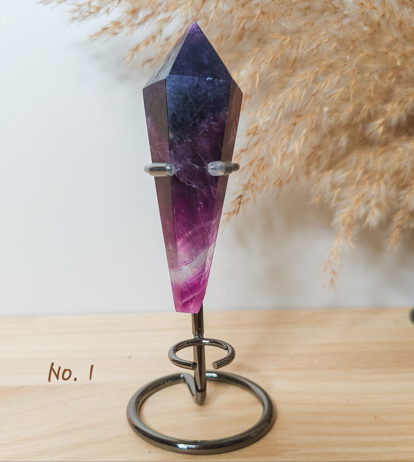 Fluorite Wands on the stand