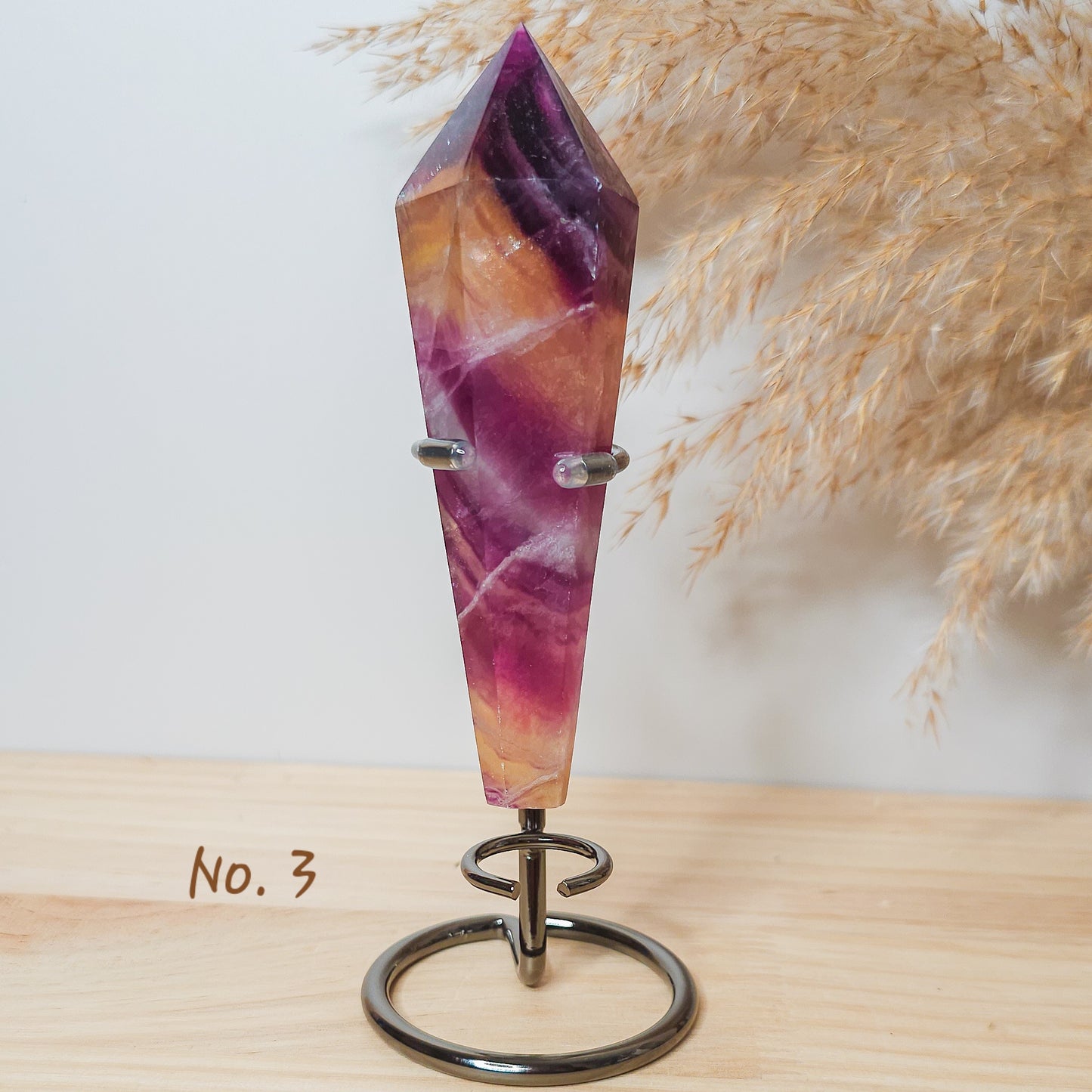 Fluorite Wands on the stand