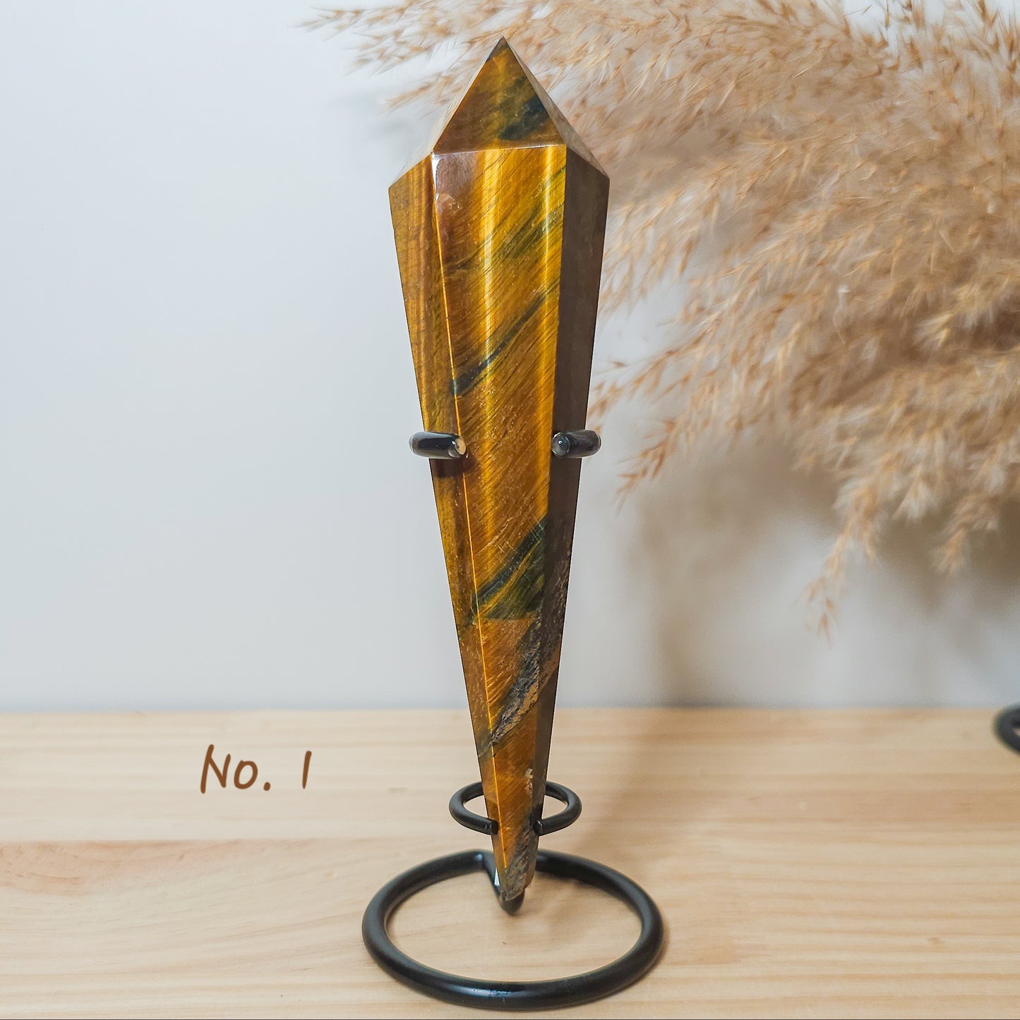 Tiger's eye Wand on the stand