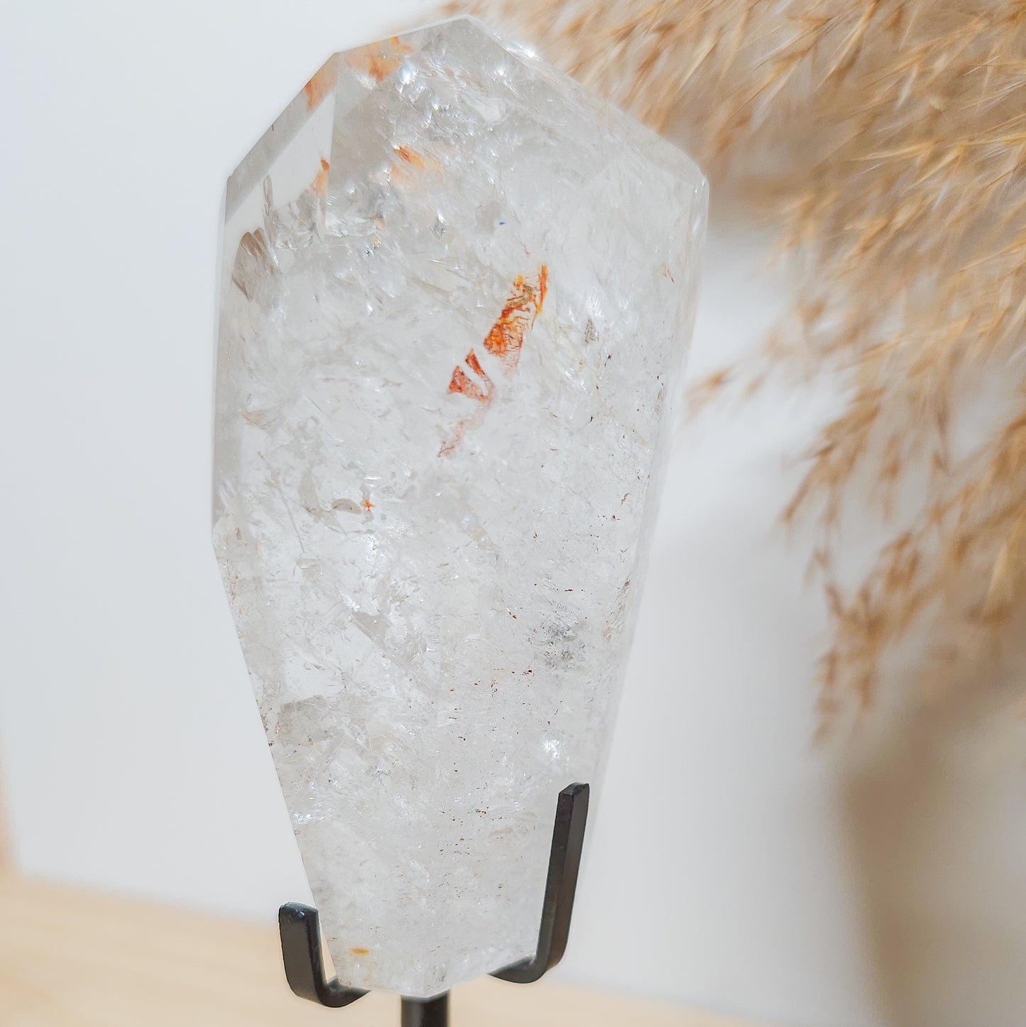 Rainbow filled Clear Quartz Free-form on the stand