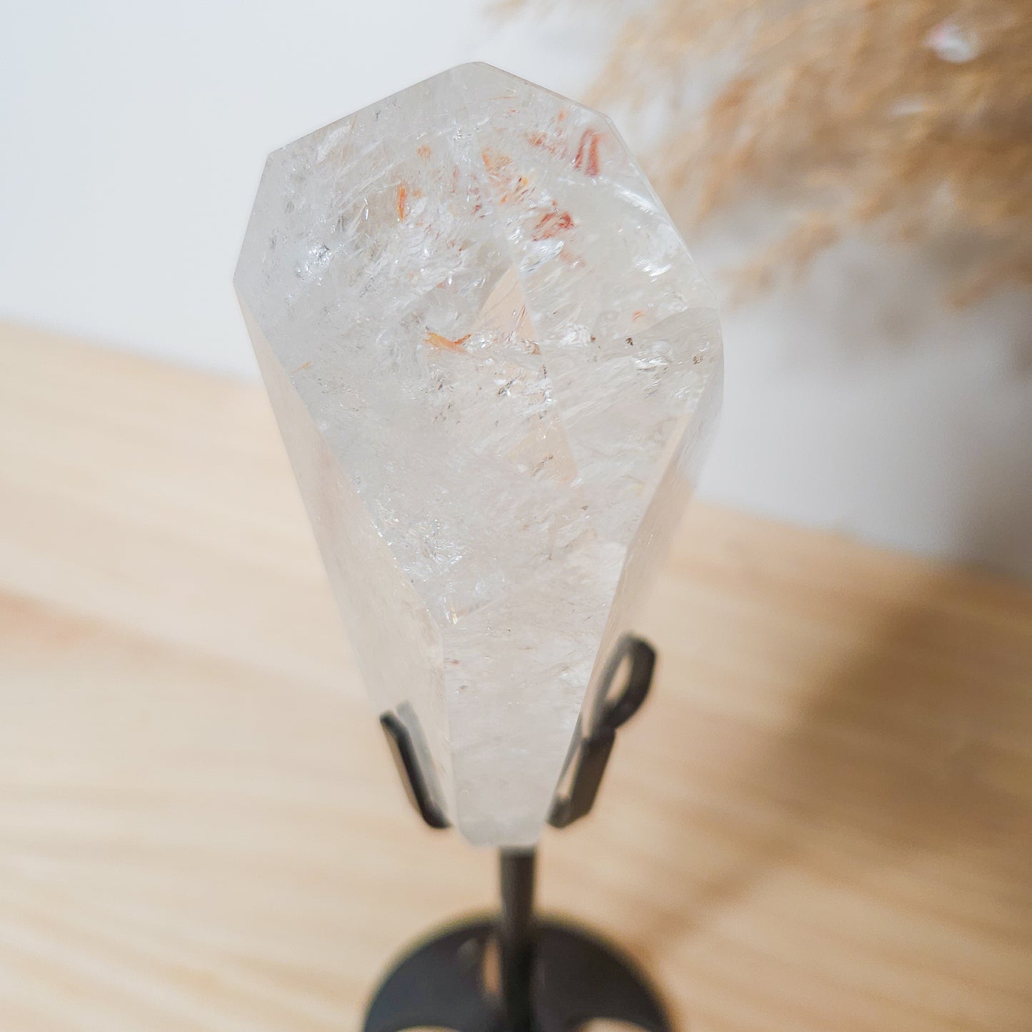 Rainbow filled Clear Quartz Free-form on the stand