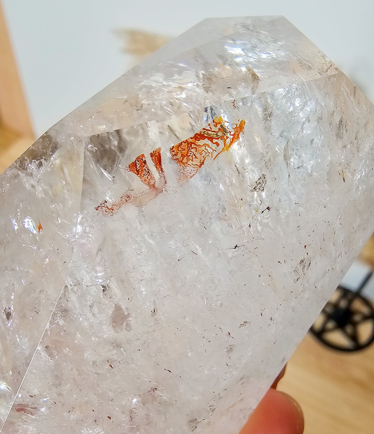 Rainbow filled Clear Quartz Free-form on the stand