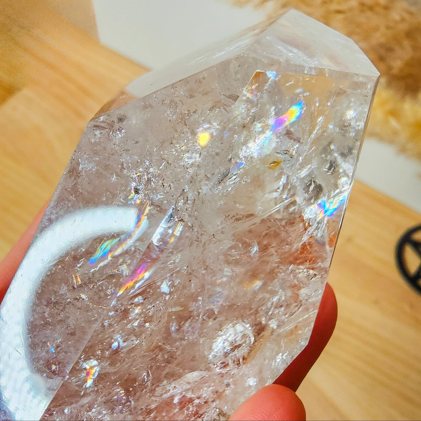 Rainbow filled Clear Quartz Free-form on the stand