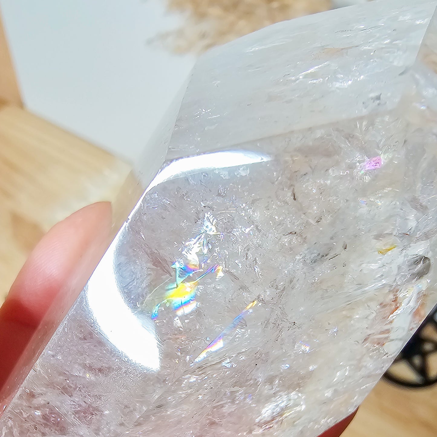 Rainbow filled Clear Quartz Free-form on the stand