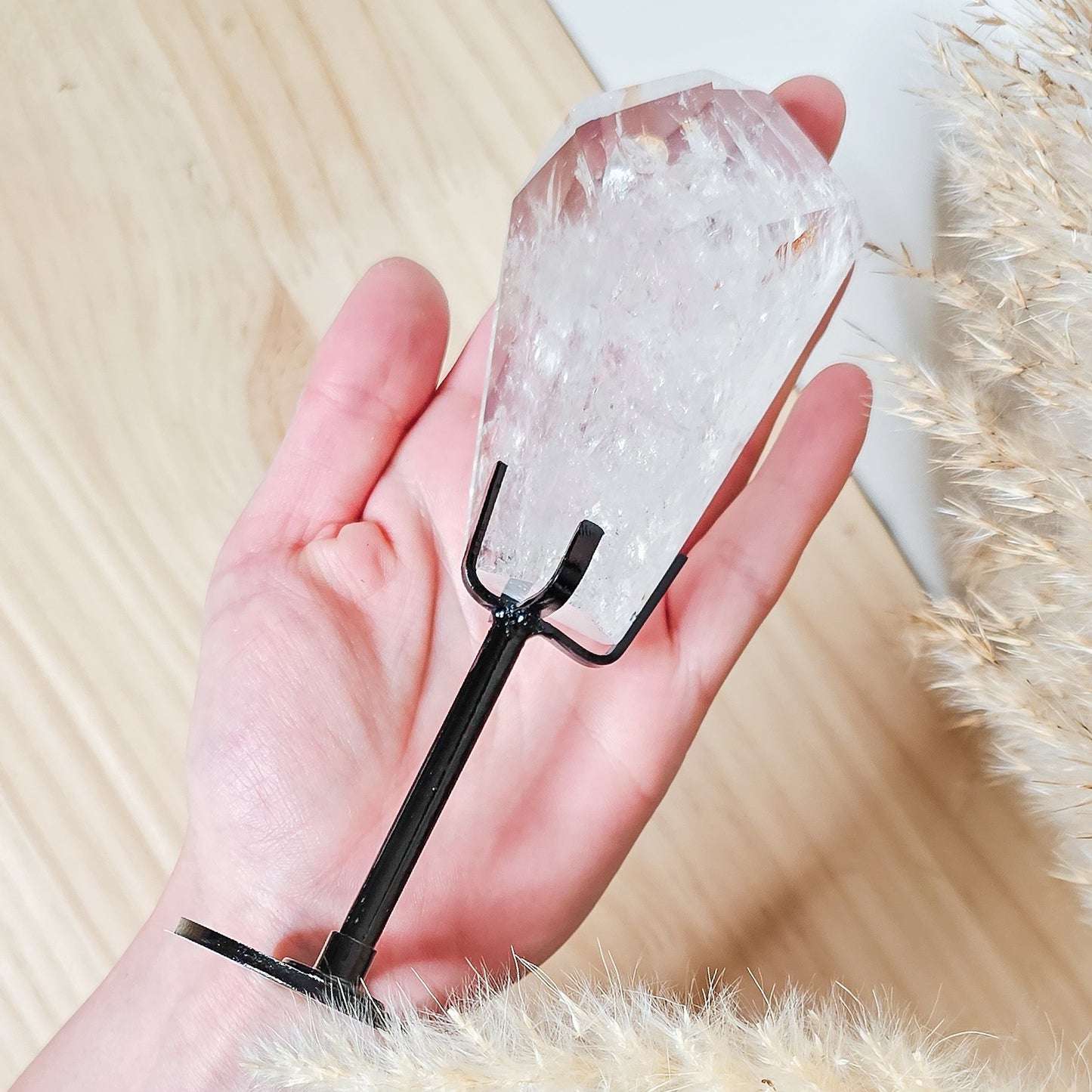 Rainbow filled Clear Quartz Free-form on the stand