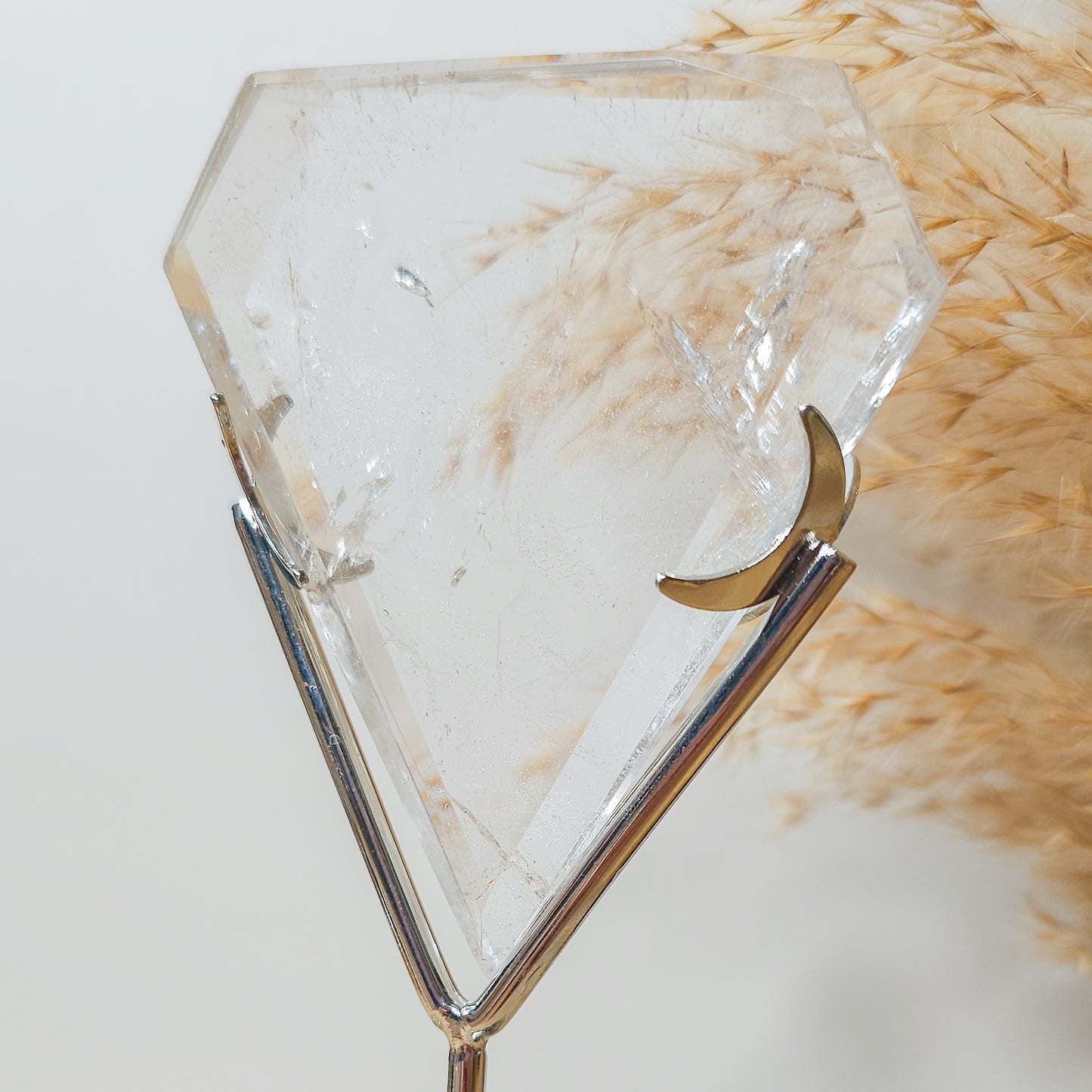 Clear Quartz Diamond on the stand