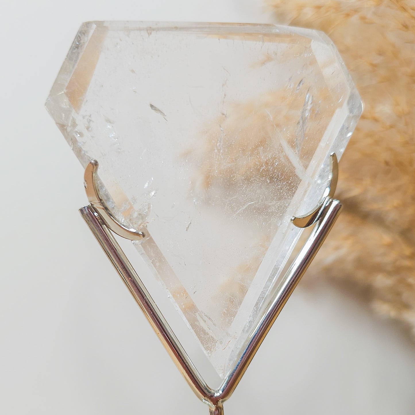 Clear Quartz Diamond on the stand