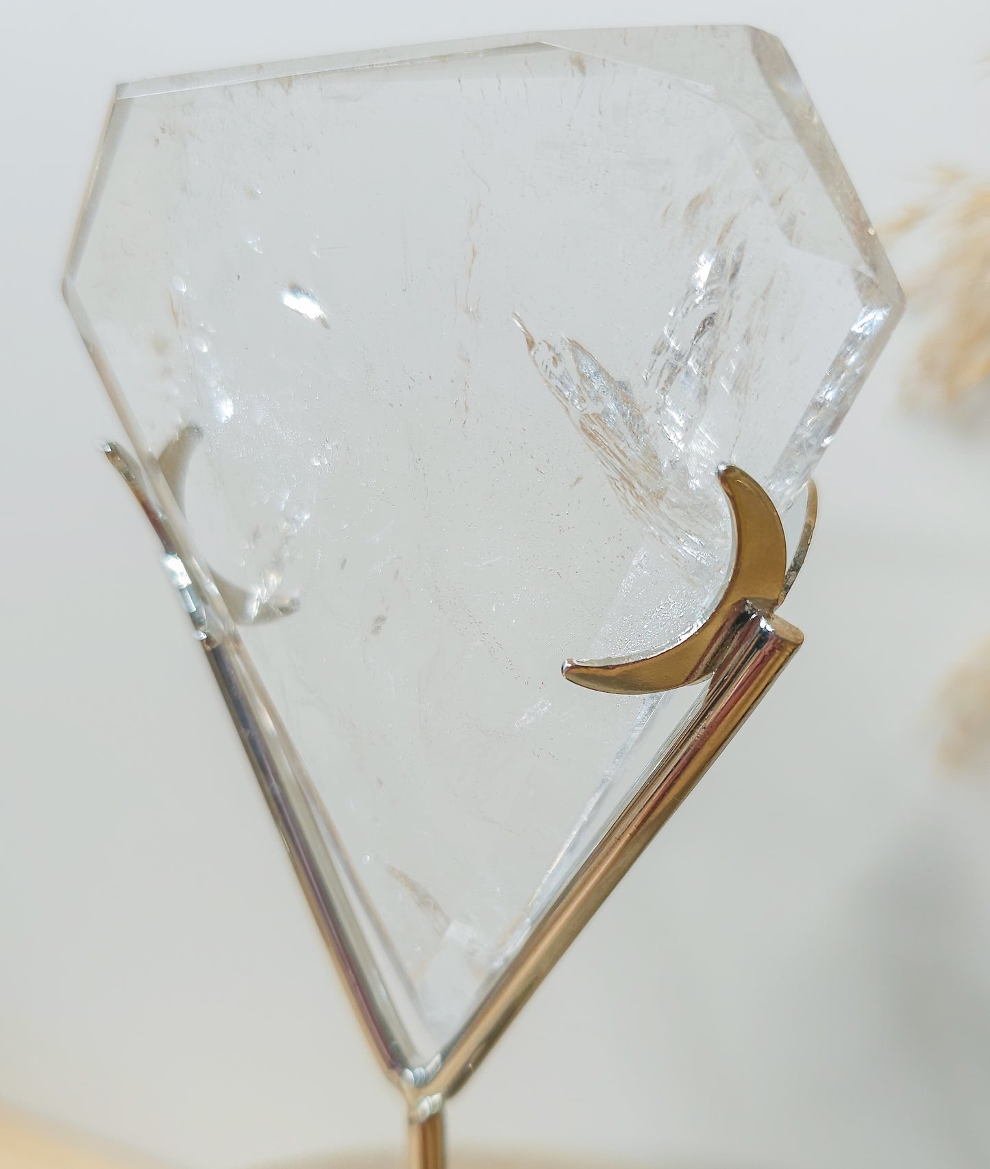 Clear Quartz Diamond on the stand