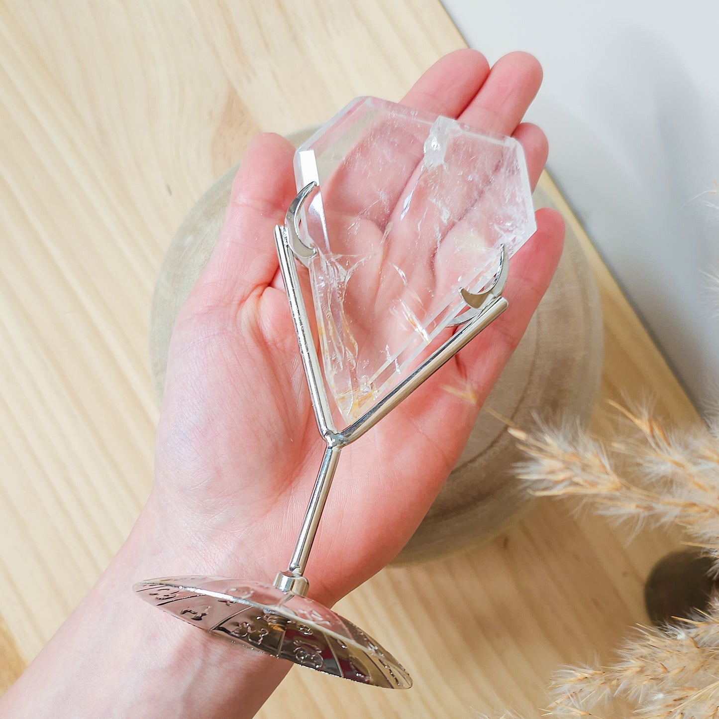 Clear Quartz with Iron Inclusions diamond on the stand