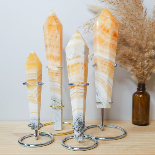 High Quality Orange Calcite Wands on the stand