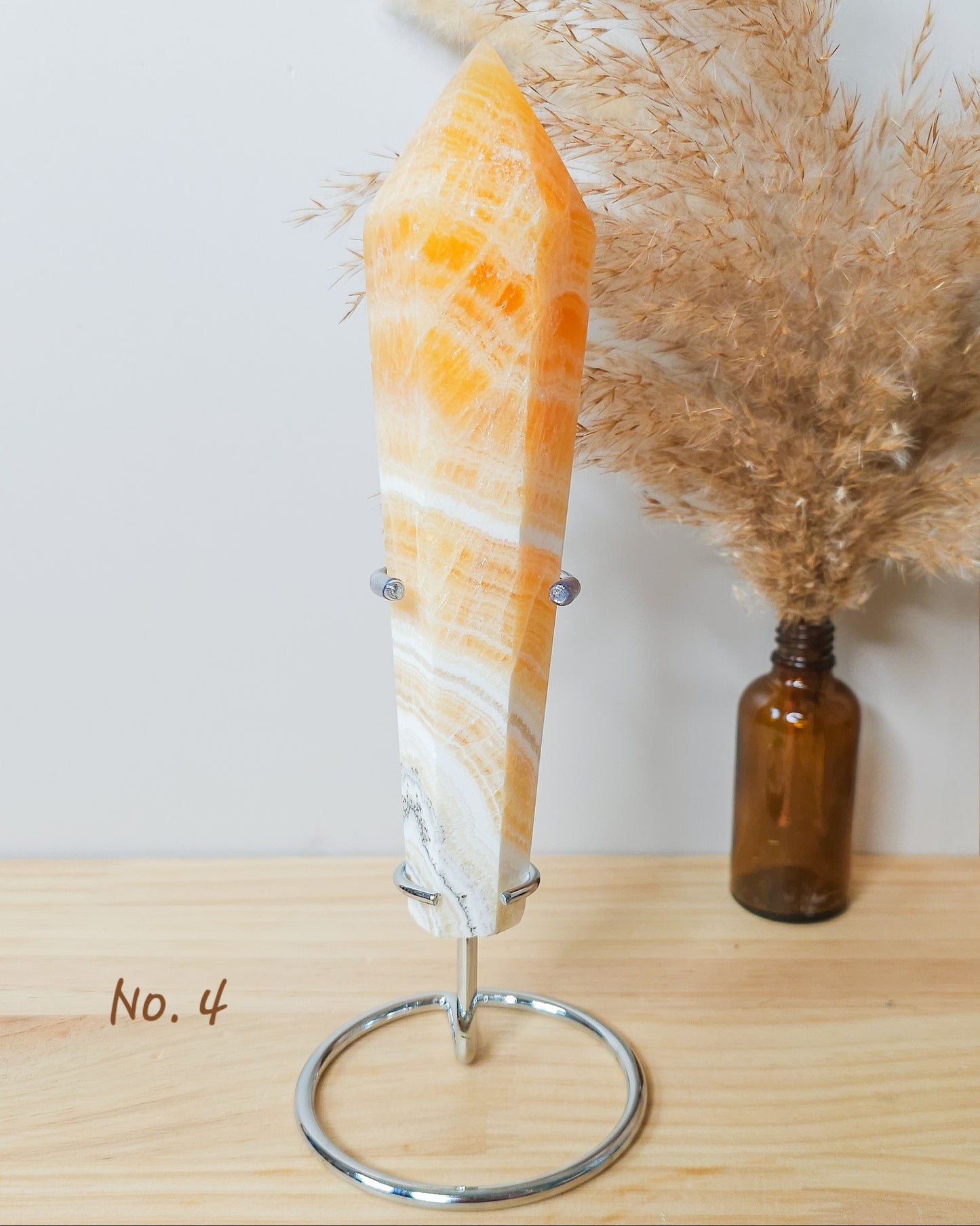 High Quality Orange Calcite Wands on the stand