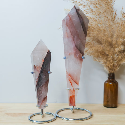 Red Hematoid/Fire Quartz Wand on the stand