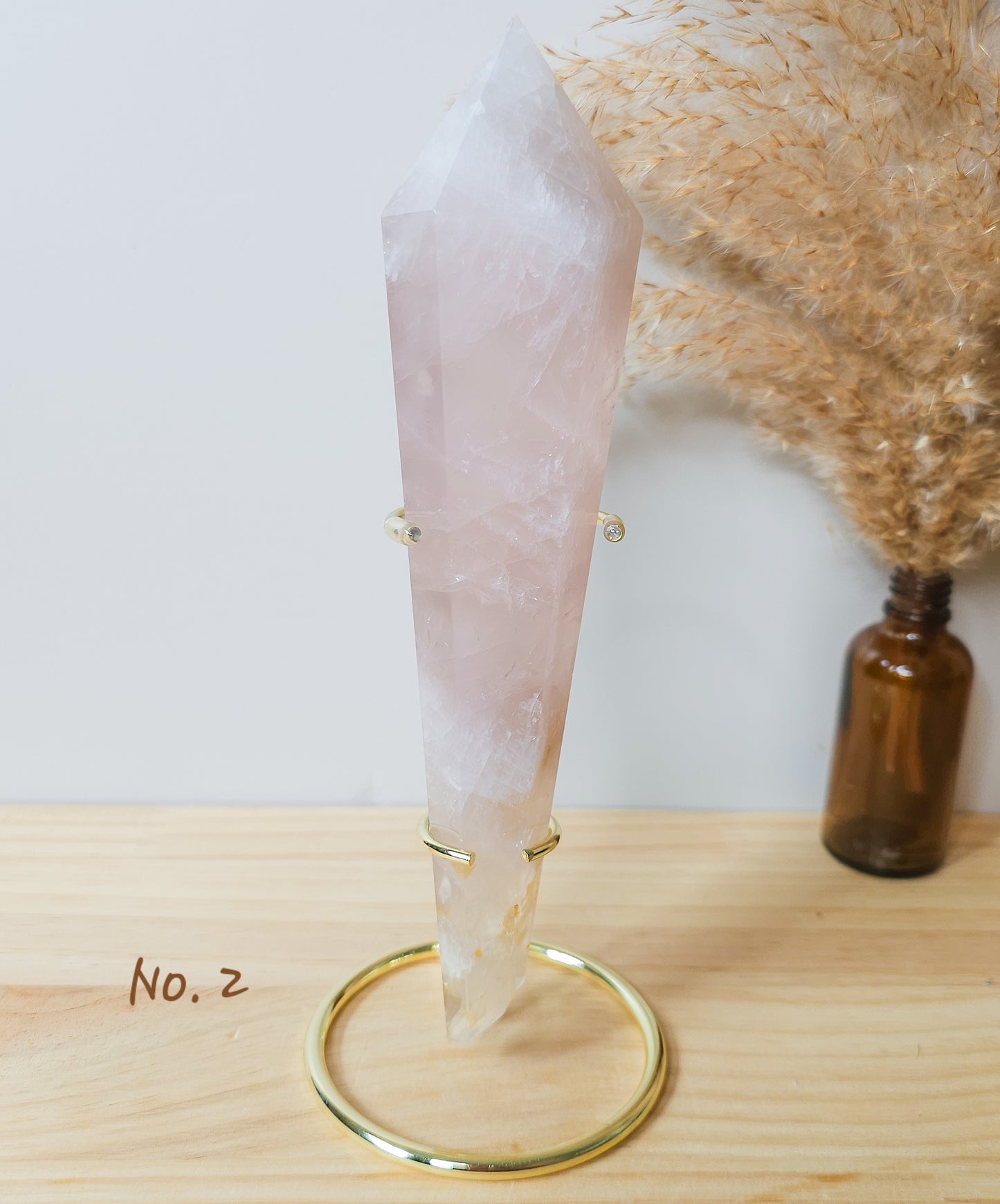 Rose Quartz Wands on the stand