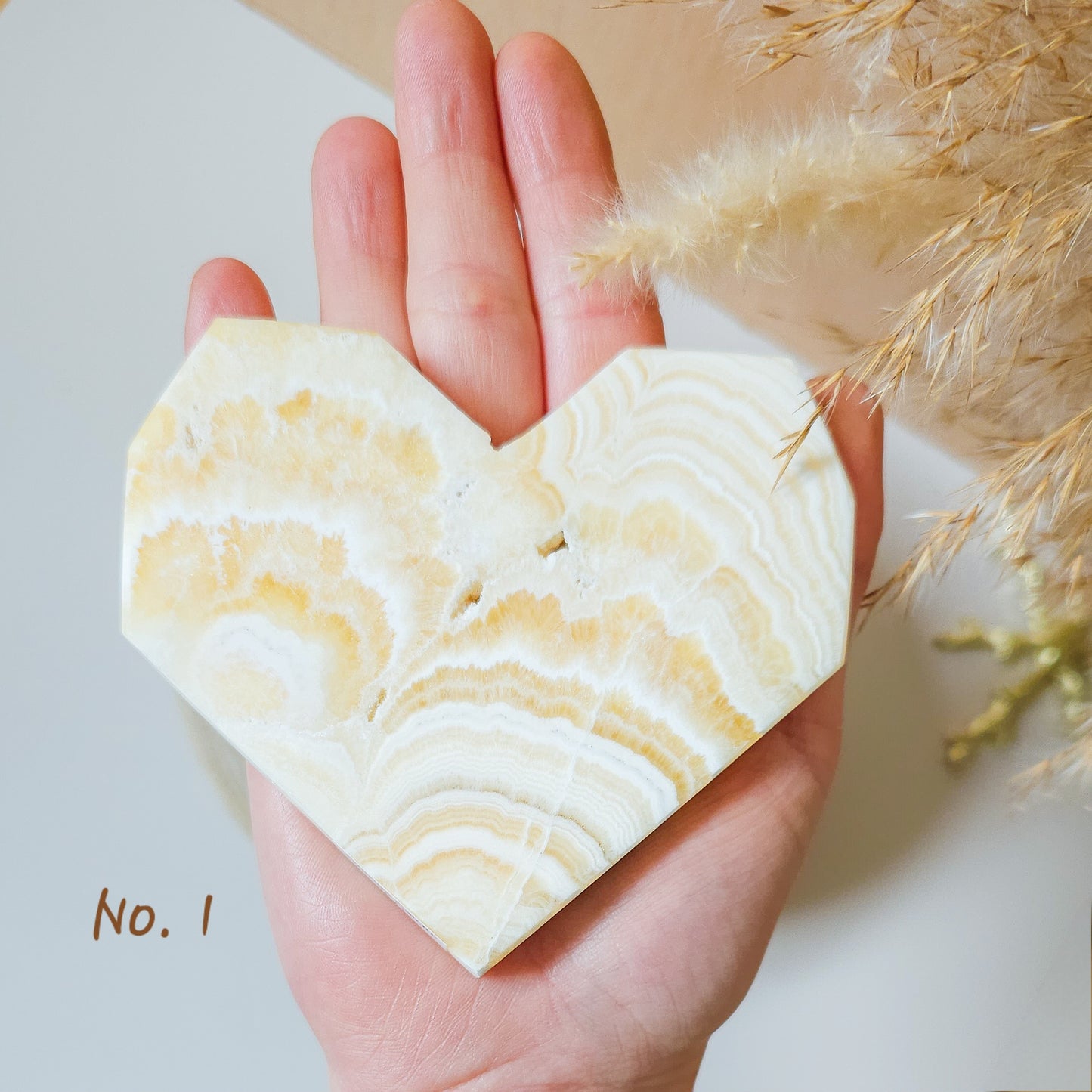 Banded Orange Calcite Hearts on stand