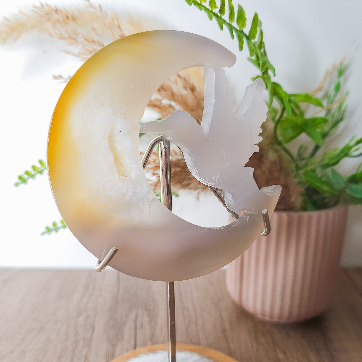 Druzy Agate Hummingbird With Moon Carving on the stand