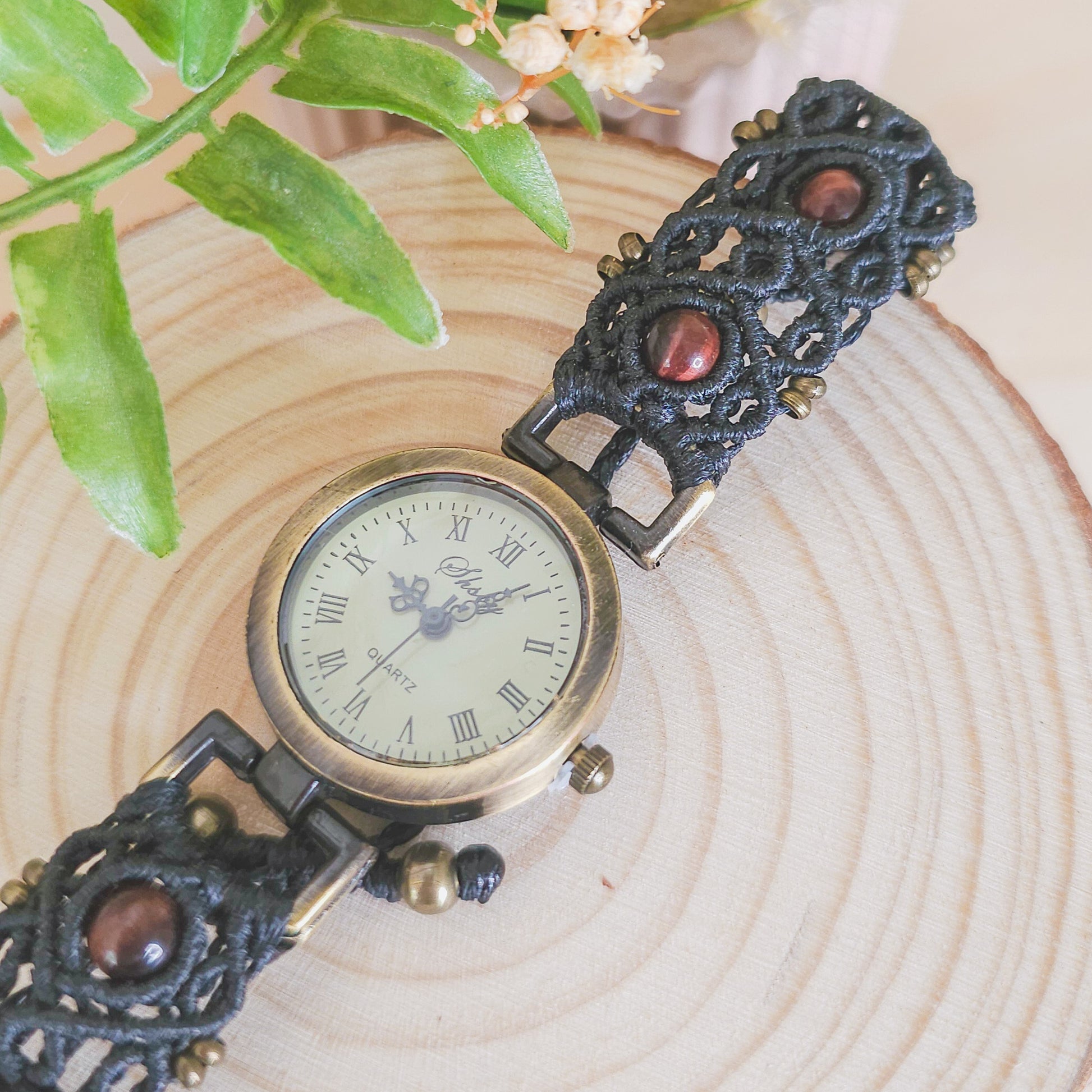 Handmade micromacrame watch with black string and red Tiger’s Eye beads, spiritual jewelry for grounding and energy balance