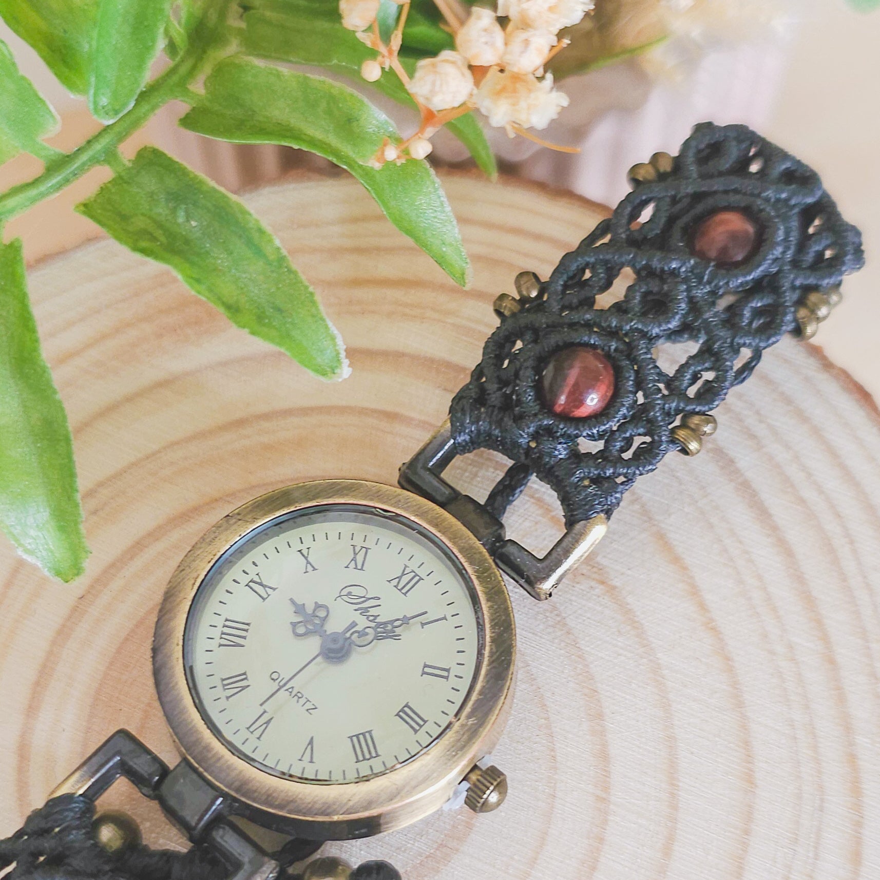 Handmade micromacrame watch with black string and red Tiger’s Eye beads, spiritual jewelry for grounding and energy balance
