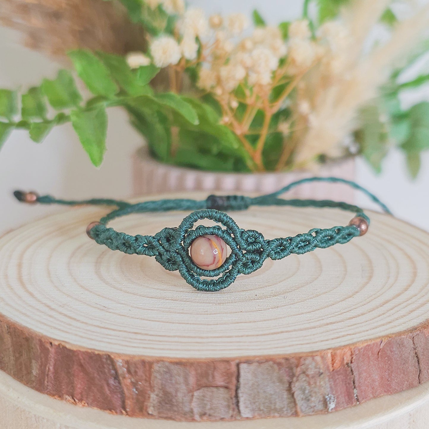 Handmade macrame bracelet with  and Mookaite, infused with Strawberry Full Moon energy for grounded adventure