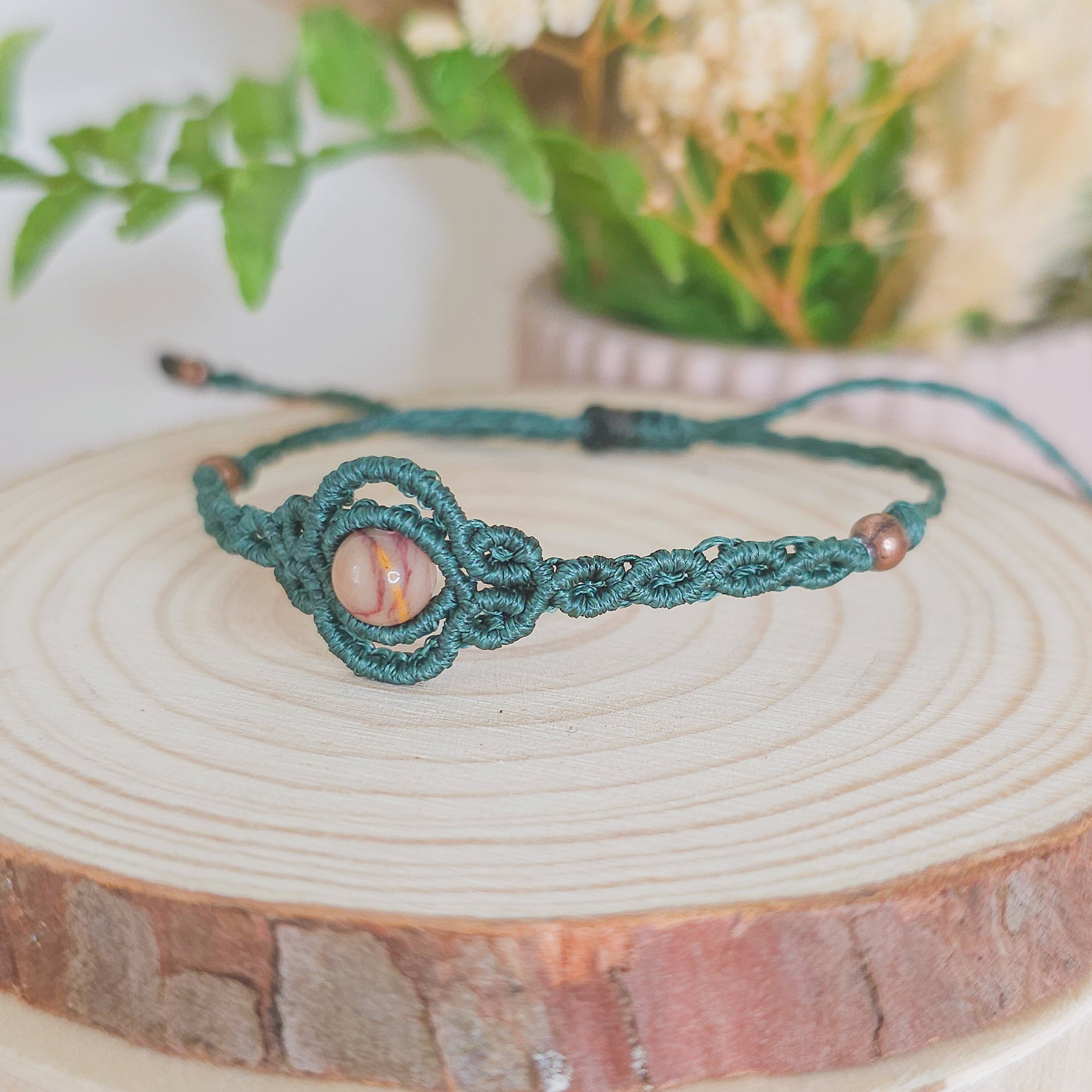 Handmade macrame bracelet with  and Mookaite, infused with Strawberry Full Moon energy for grounded adventure