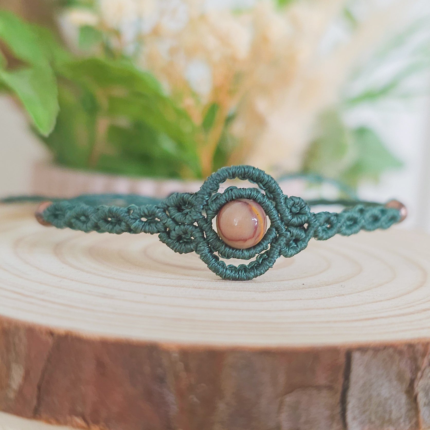 Handmade macrame bracelet with  and Mookaite, infused with Strawberry Full Moon energy for grounded adventure