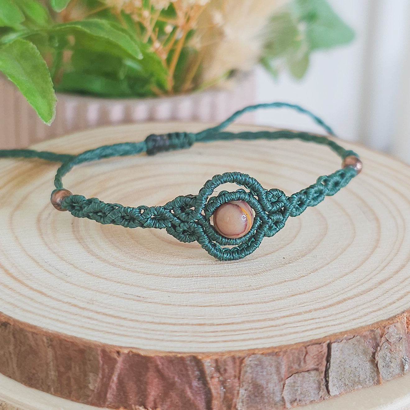 Handmade macrame bracelet with  and Mookaite, infused with Strawberry Full Moon energy for grounded adventure