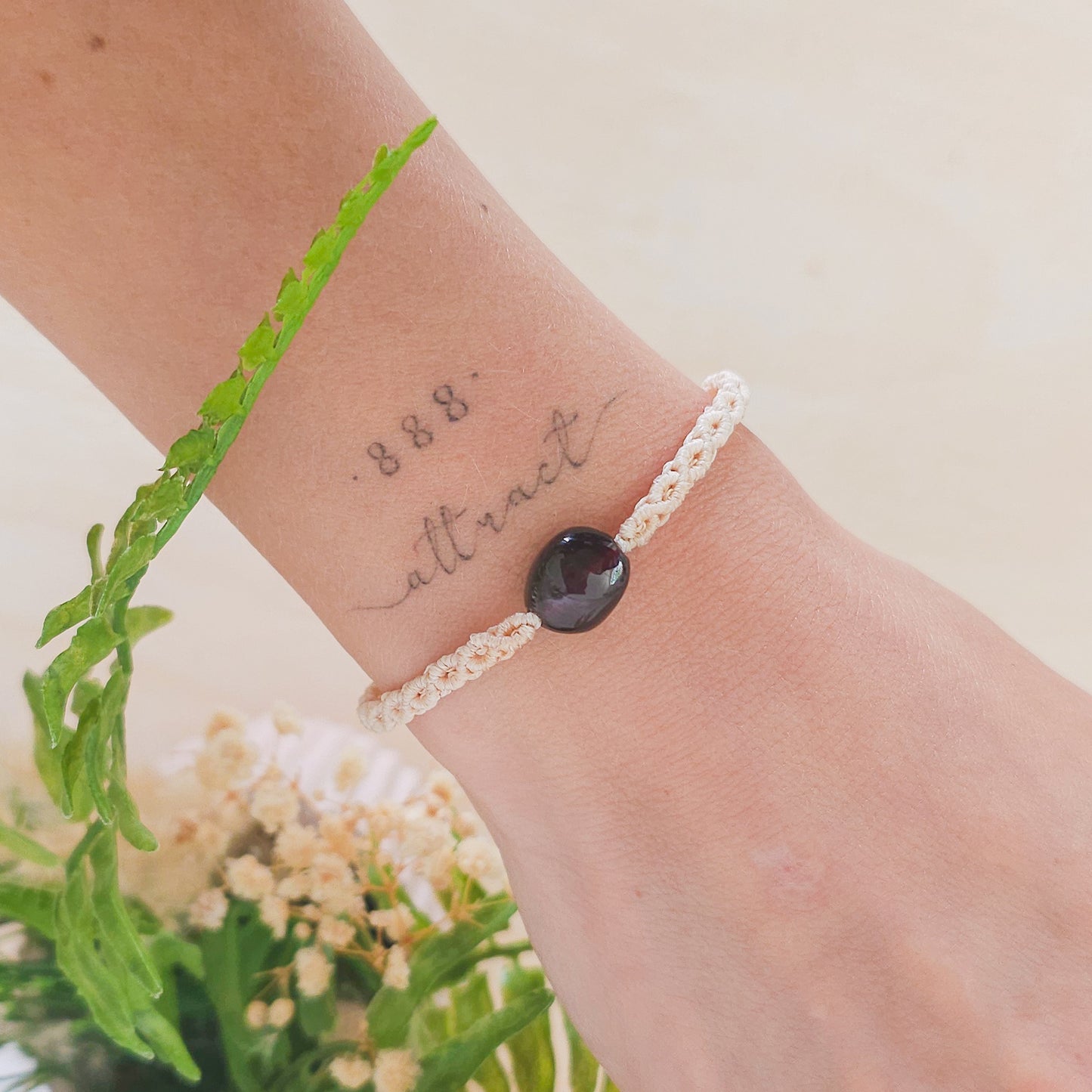 Handmade macrame bracelet with Garnet beads, infused with intention to support strength, grounding, and soul alignment