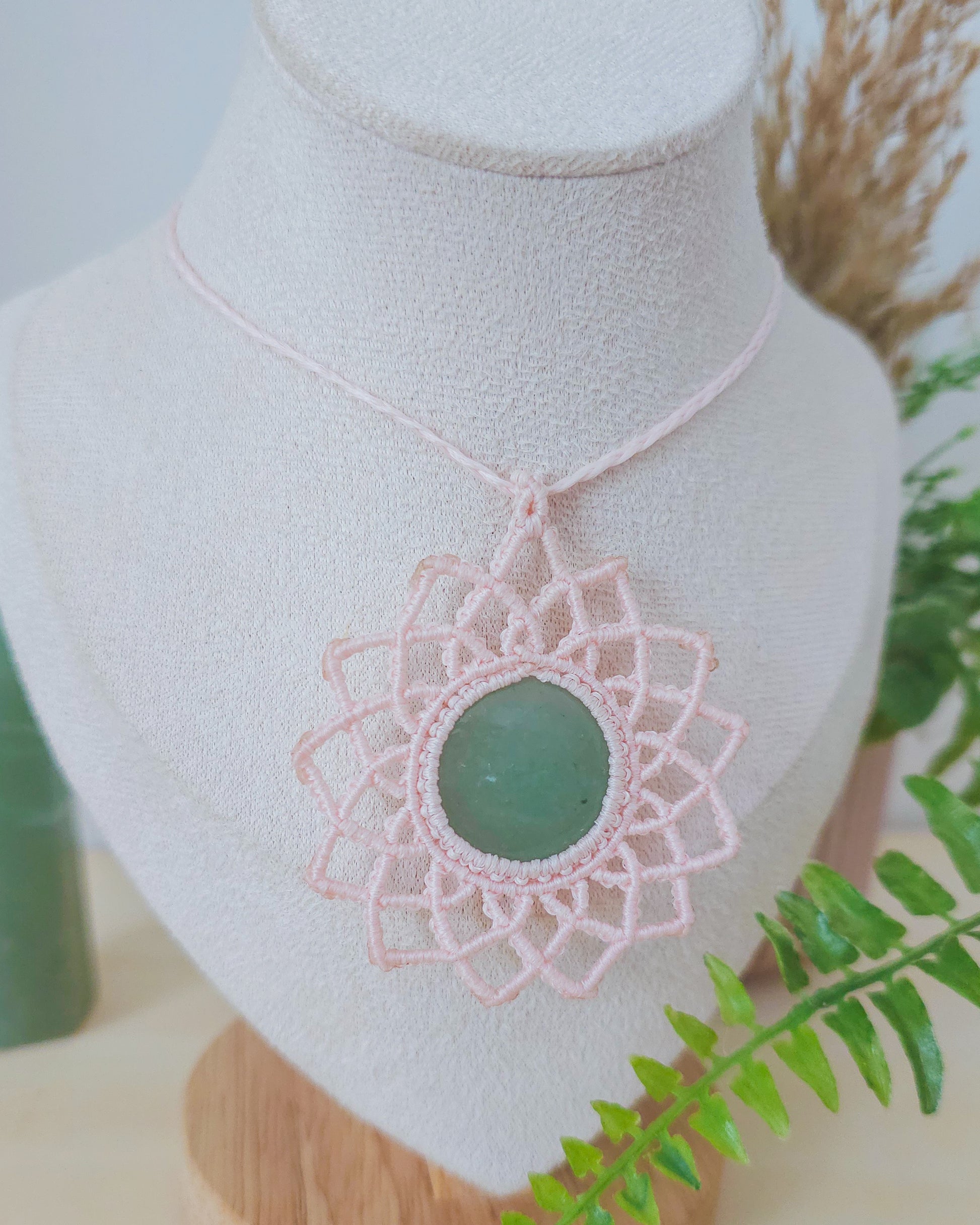 Close-up of Green Aventurine mandala necklace, a crystal jewelry piece symbolizing abundance, growth, and opportunity.
