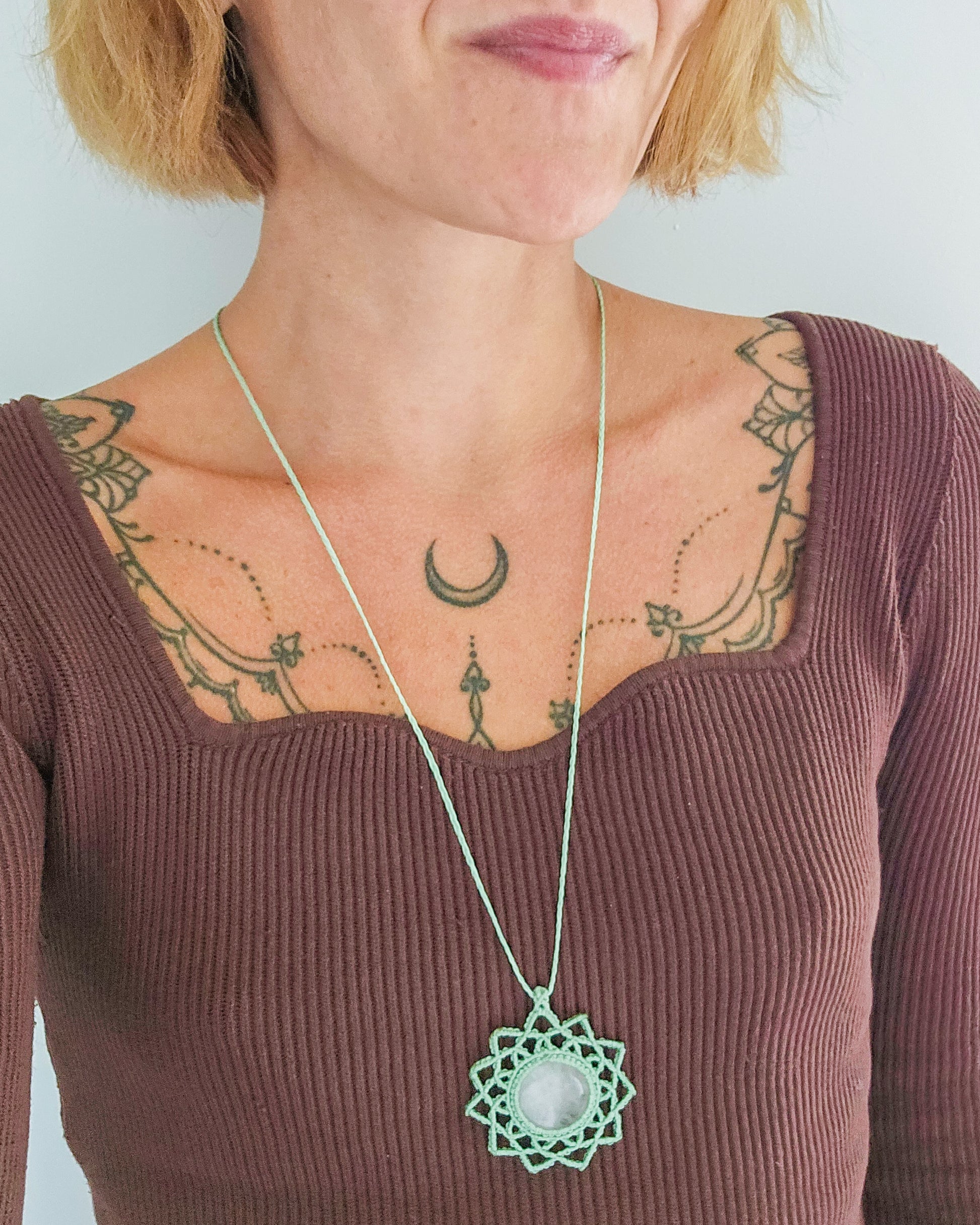 Circle-shaped macrame necklace featuring natural Rose Quartz, symbolizing love, beauty, and divine feminine energy