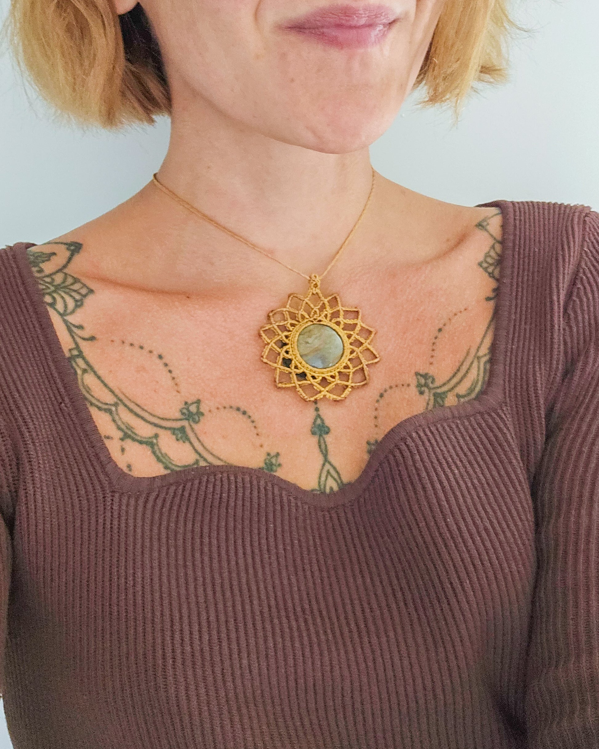 Artisan macrame necklace featuring natural Jasper, designed for stability, strength, and emotional resilience.