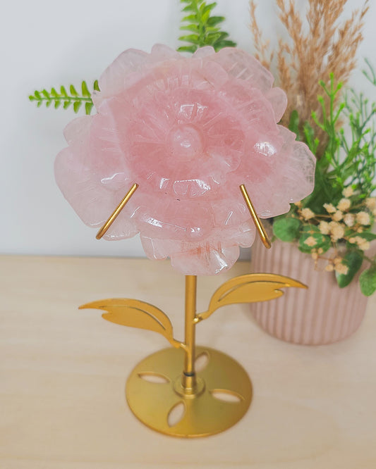  Rose Quartz flower crystal on metal stand, soft pink hues symbolizing unconditional love, heart healing, and emotional balance.
