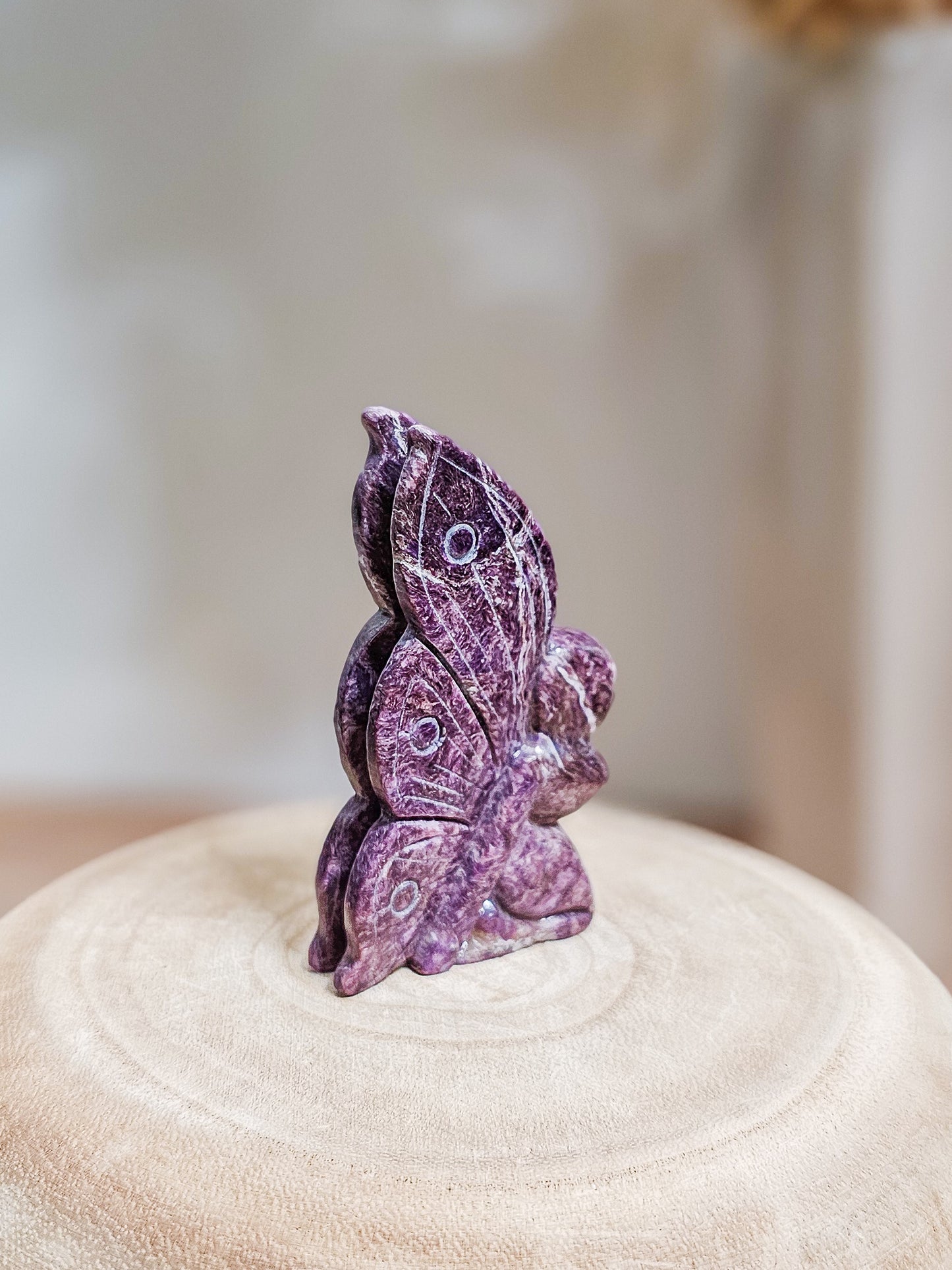 Delicate Charoite fairy sculpture, ideal for spiritual display, meditation, or crystal collection