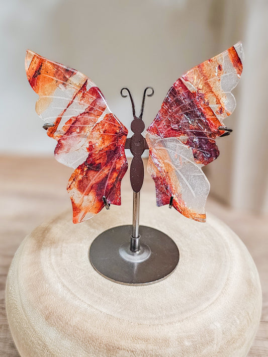 Fire quartz butterfly wings sculpture, symbolising grounded transformation and vitality