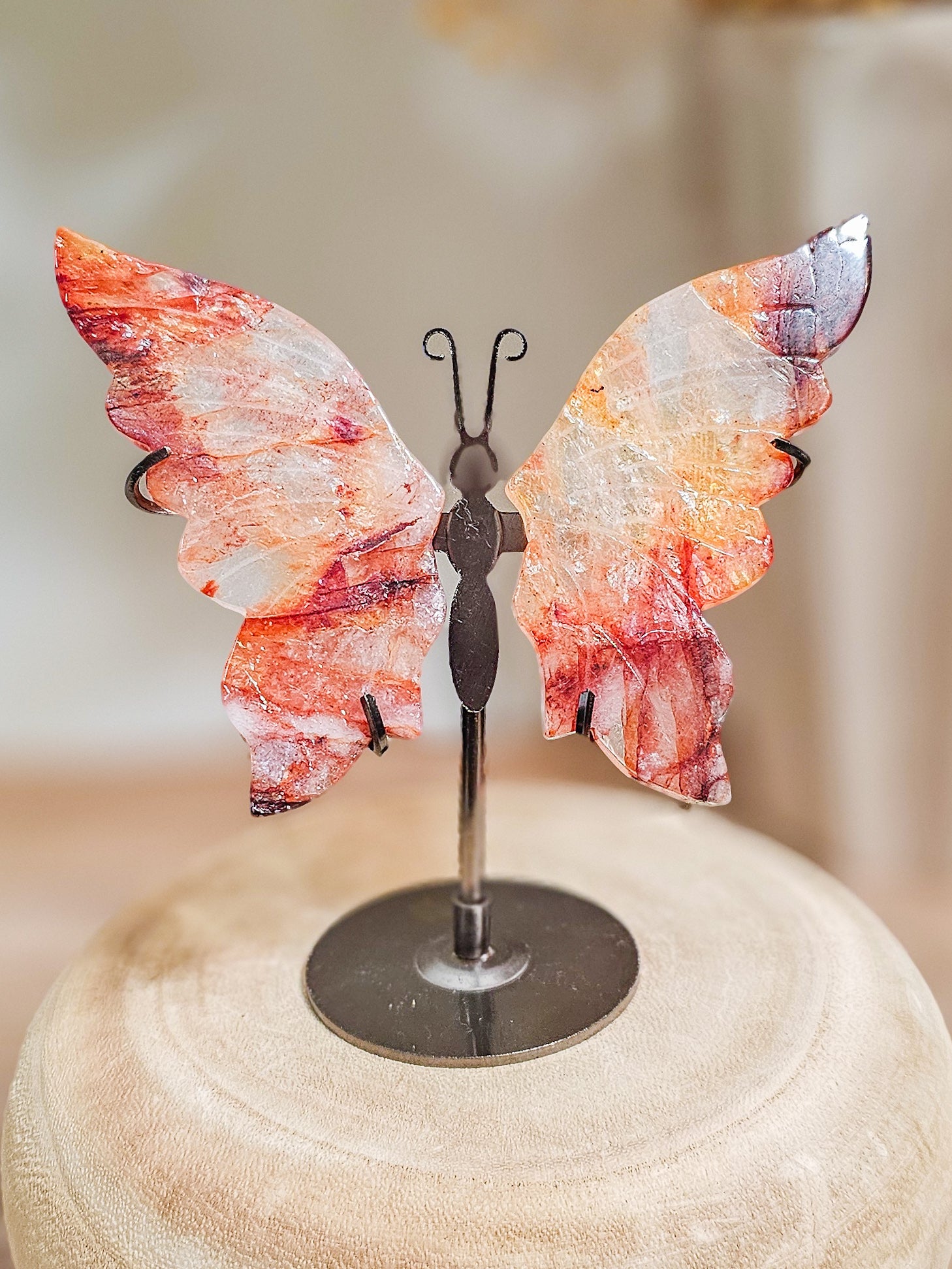 Butterfly wings crystal carving in red hematoid quartz, ideal for altar, meditation, or grounding decor
